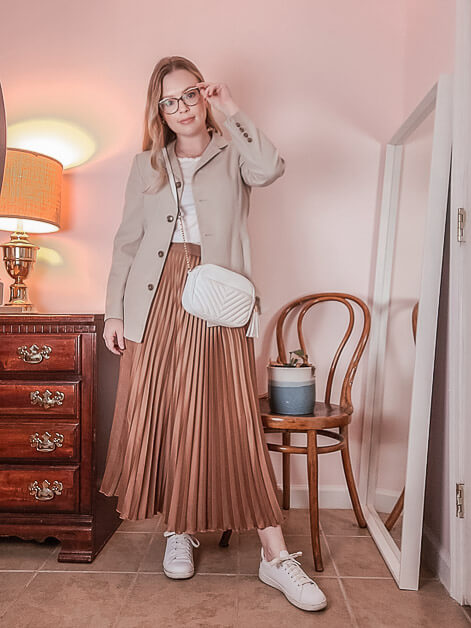 Pleated skirt outfit with sneakers
